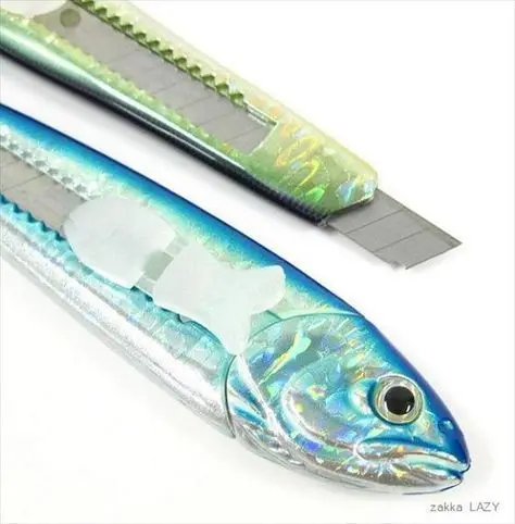 Upgrade your fishing game with this precision fish razor. Explore the art of fishing with two different types of fishing lures on a white surface.